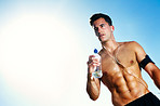 Young muscular man with a water bottle - Outdoor