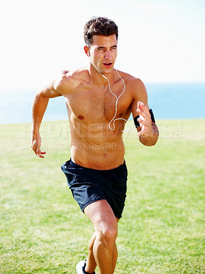 Buy stock photo Portrait of a muscular young man running against sky - Outdoor
