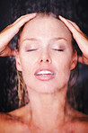 Closeup of a lovely woman taking a shower