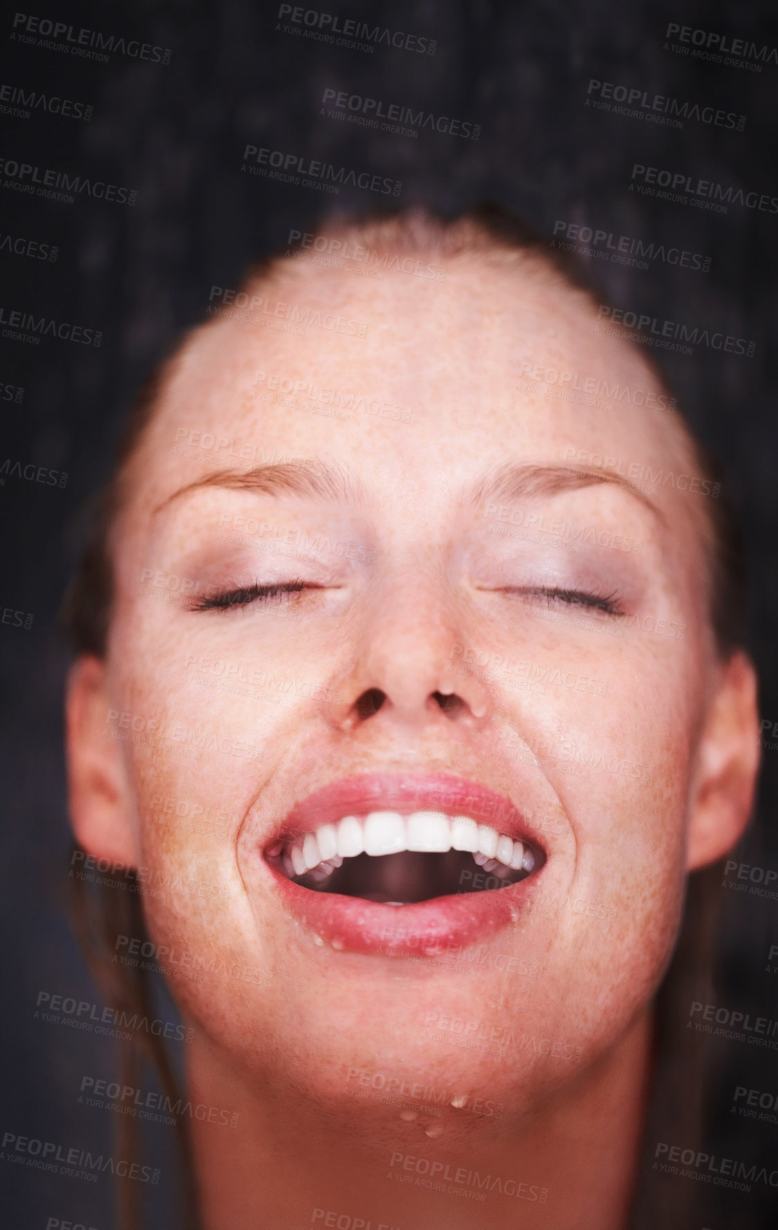 Buy stock photo Shower, water splash and face of happy woman in a house for hygiene, fresh or stress relief closeup. Smile, bathroom and female person relax with cleaning, wellness or body care, skincare or routine