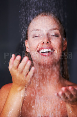 Buy stock photo Shower, woman and water drops in studio for relax, healthy skincare or wellness with peace in mockup. Young model, happy and natural glow of cleaning body and self care for beauty by black background