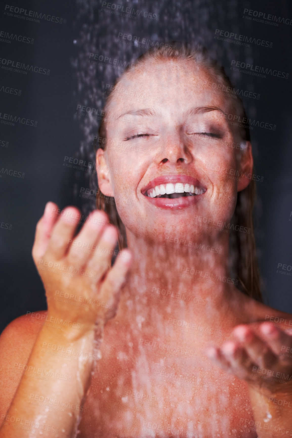 Buy stock photo Shower, woman and water drops in studio for relax, healthy skincare or wellness with peace in mockup. Young model, happy and natural glow of cleaning body and self care for beauty by black background