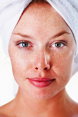 Buy stock photo Portrait, skincare and woman with a towel, cosmetics and hygiene with wellness, healthy skin and shine. Face, person and girl with head wrap, facial and freckles with glowing, luxury and aesthetic