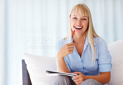 Buy stock photo Portrait, documents and business woman on a sofa in an office with a mindset of future company growth. Smile, planning or strategy and a happy young employee with papers in the workplace lounge
