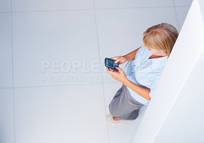 Buy stock photo Businesswoman, cellphone and texting in office networking planning, online collaboration or typing conversation. Female person, digital mobile and corporate communication, internet or notification