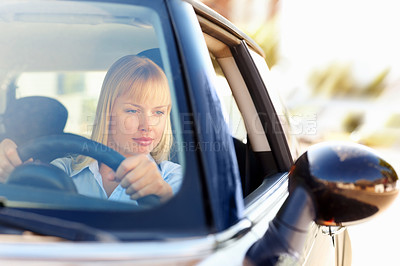 Buy stock photo Window, woman and driving car for parking with road trip journey, solo holiday or assessment for license. Female driver, auto transport and suv vehicle for weekend travel and check mirror for safety