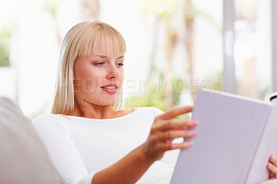 Buy stock photo Portrait of university student reading book at home