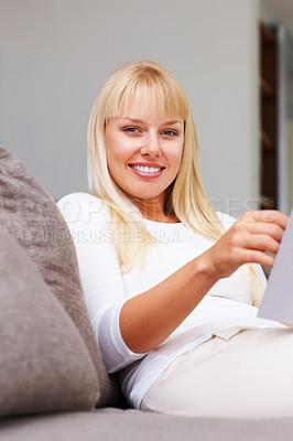 Buy stock photo Portrait, student and woman with reading, book at home in preparing for exam or test at university. Female person, learning and development with cheerful, confident for education on couch for college