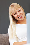 Smiling blond with laptop