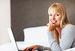 Relaxed young woman with laptop