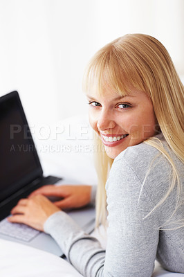 Buy stock photo Portrait, smile and woman with laptop in home for reading, relax and e learning for scholarship. Female student, email and person with technology, research or online for planning project for college 