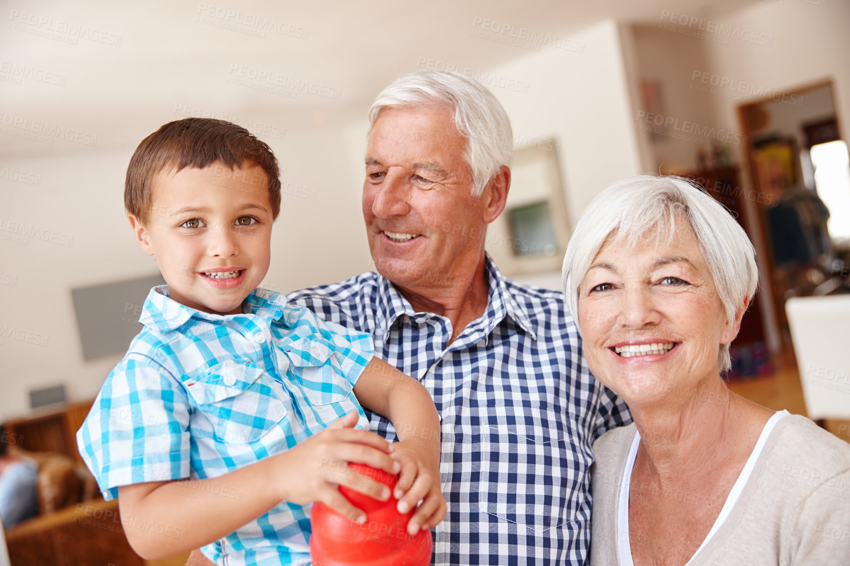 Buy stock photo Cropped shot of a little boy with his grandparents