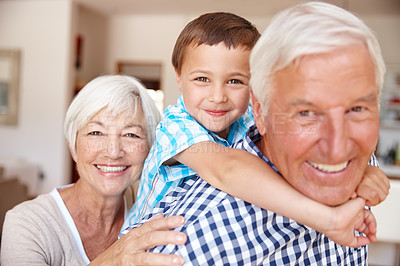 Buy stock photo Cropped shot of a young boy with his grandparents