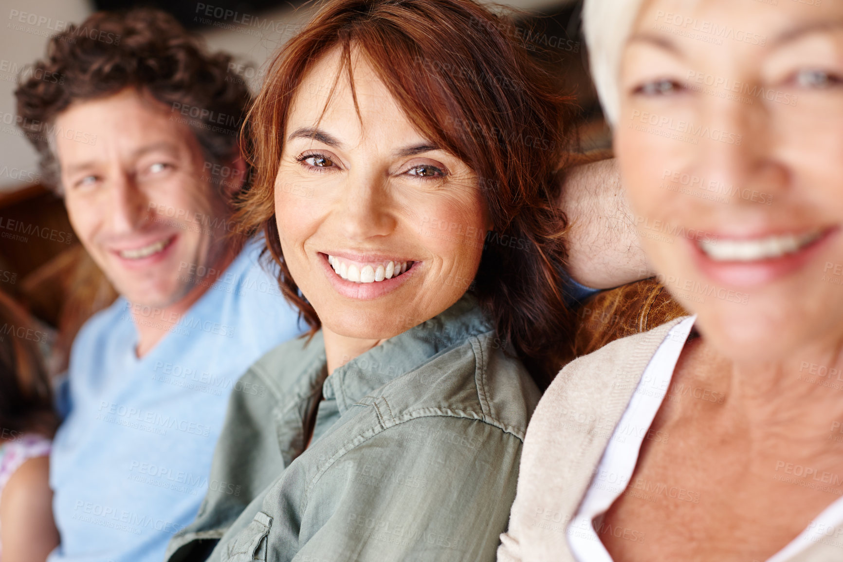 Buy stock photo Portrait of a mature woman sitting between her husband and mother