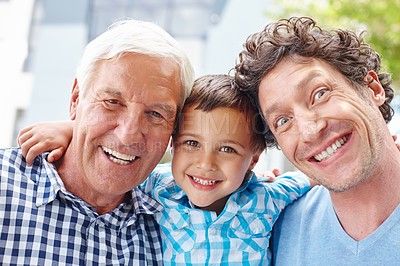 Buy stock photo Portrait of a little boy with his father and grandfather