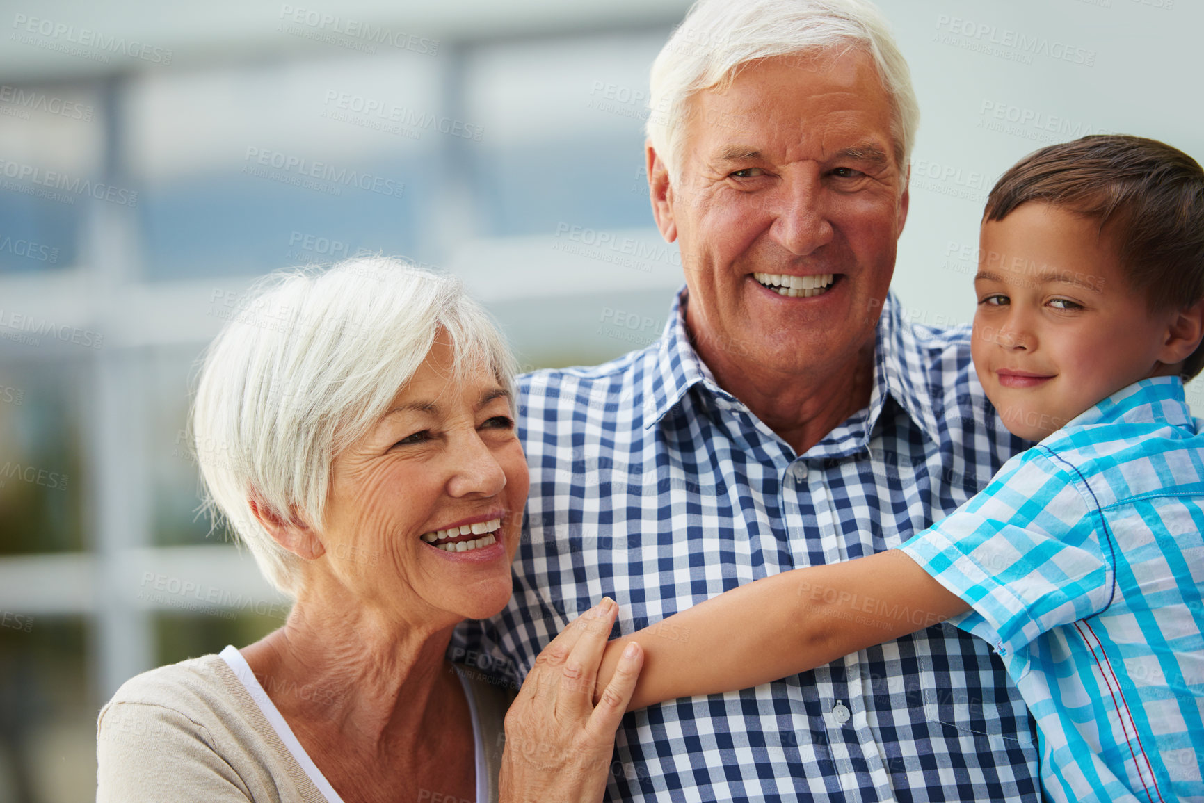 Buy stock photo Cropped shot of a little boy with his grandparents