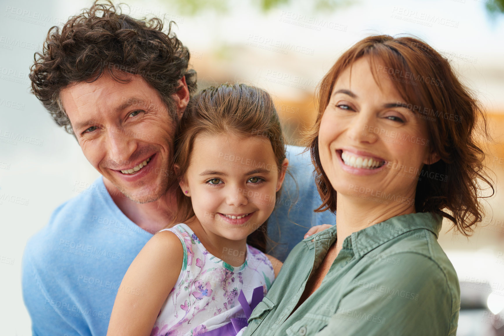 Buy stock photo Portrait of a little girl with her mother and father