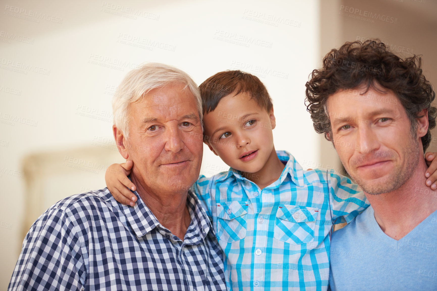 Buy stock photo Portrait of a little boy with his father and grandfather