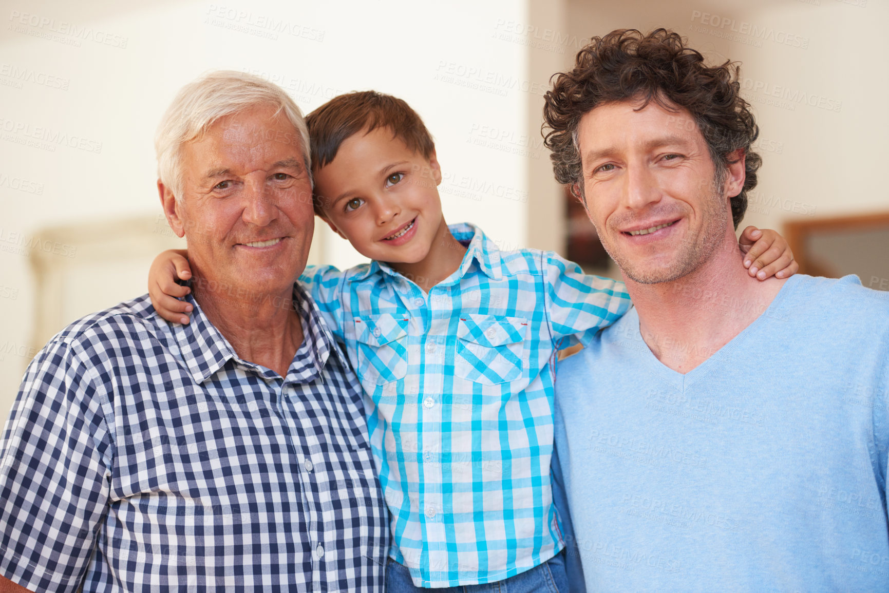 Buy stock photo Portrait of a little boy with his father and grandfather