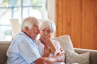 Buy stock photo Shot of a senior man consoling his wife