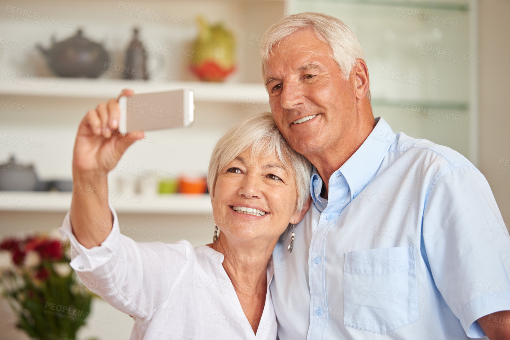 Buy stock photo Selfie, smile and senior couple in home for memory, profile picture and bonding for online post. Retirement, marriage and elderly man and woman in kitchen for photo, social media and happy for love