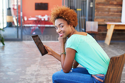 Buy stock photo Cropped shot of an attractive young businesswoman working in the office