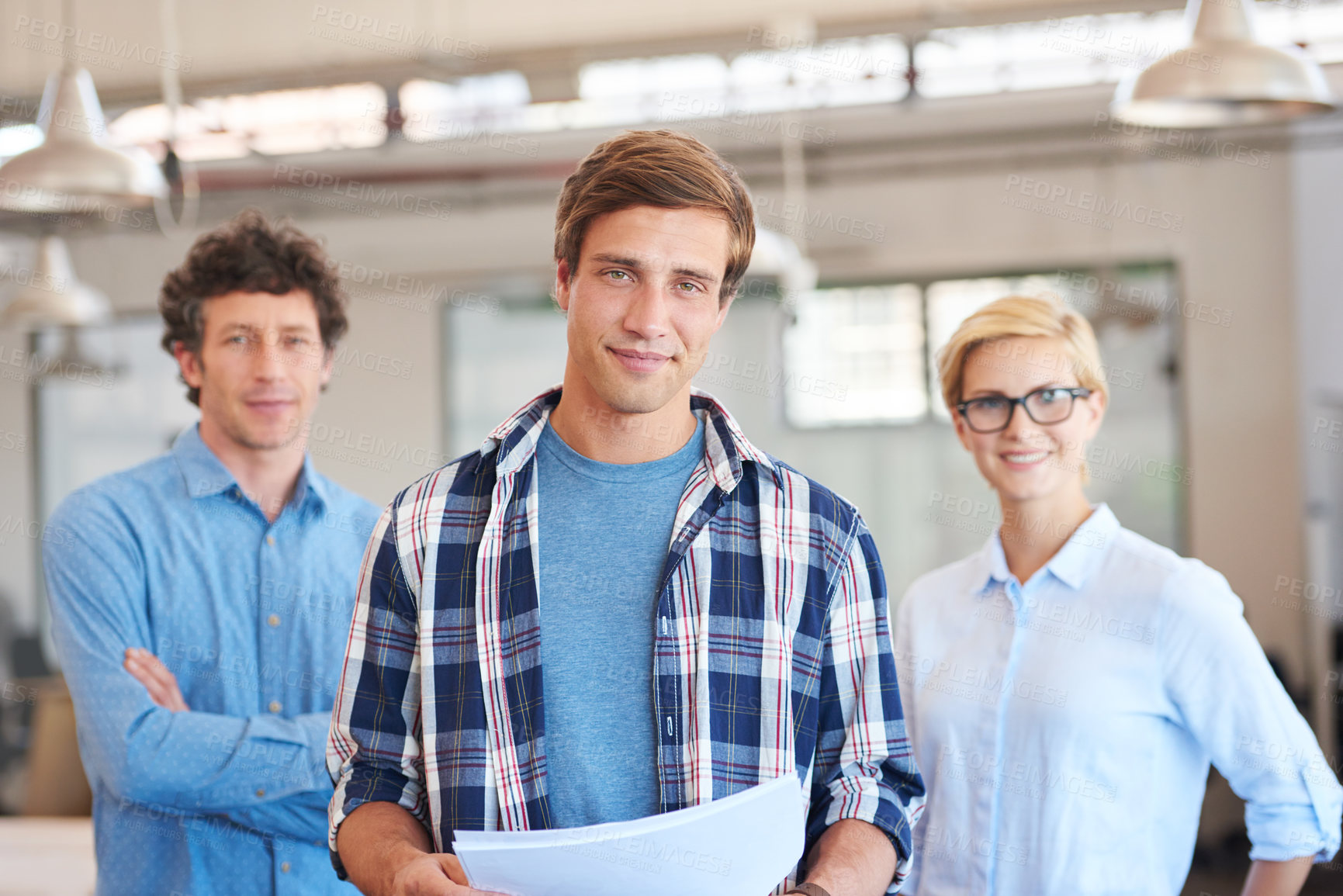 Buy stock photo Cropped portrait of three businesspeople standing in the office