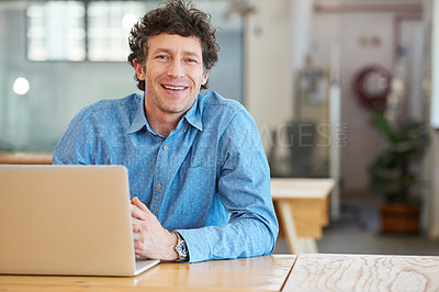 Buy stock photo Cropped shot of a handsome businessman working in the office