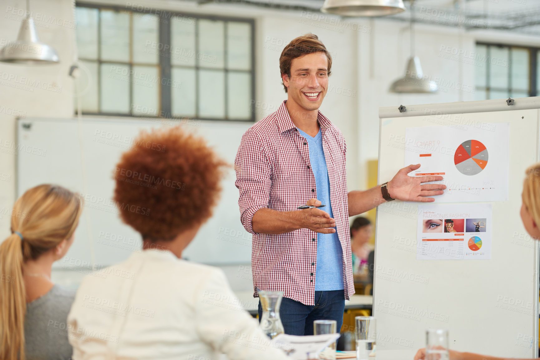 Buy stock photo Shot of a team of young professionals in a business presentation