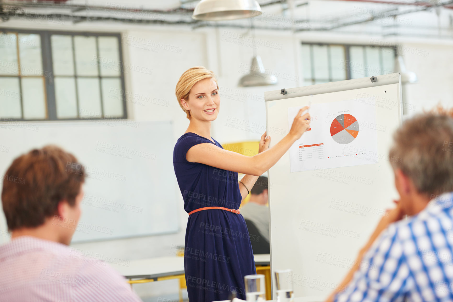 Buy stock photo Shot of a team of young professionals in a business presentation