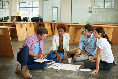 Buy stock photo Shot of a group of designers working together on a office floor