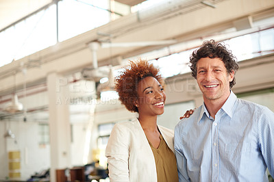Buy stock photo Portrait of two coworkers standing in an office