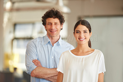 Buy stock photo Portrait of two coworkers standing in an office