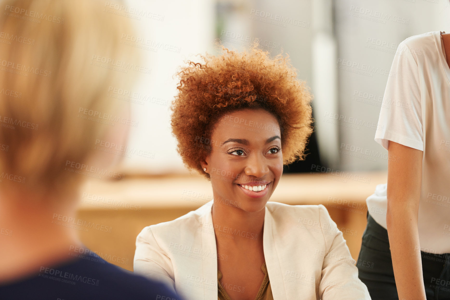 Buy stock photo Listening, woman and happy in meeting in office to story ideas, topics briefing and news feedback. Publishing agency, team and journalist with attention in brainstorming session for article insight