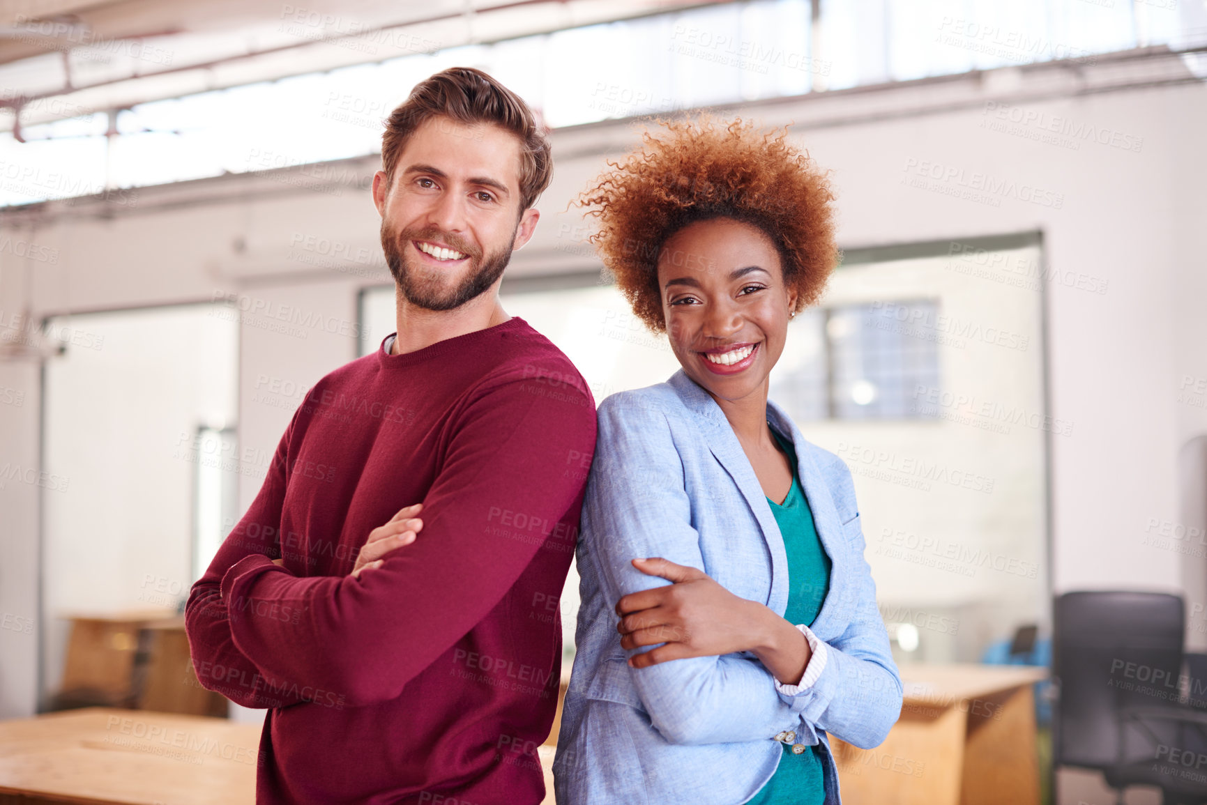 Buy stock photo Portrait of two coworkers standing in an office