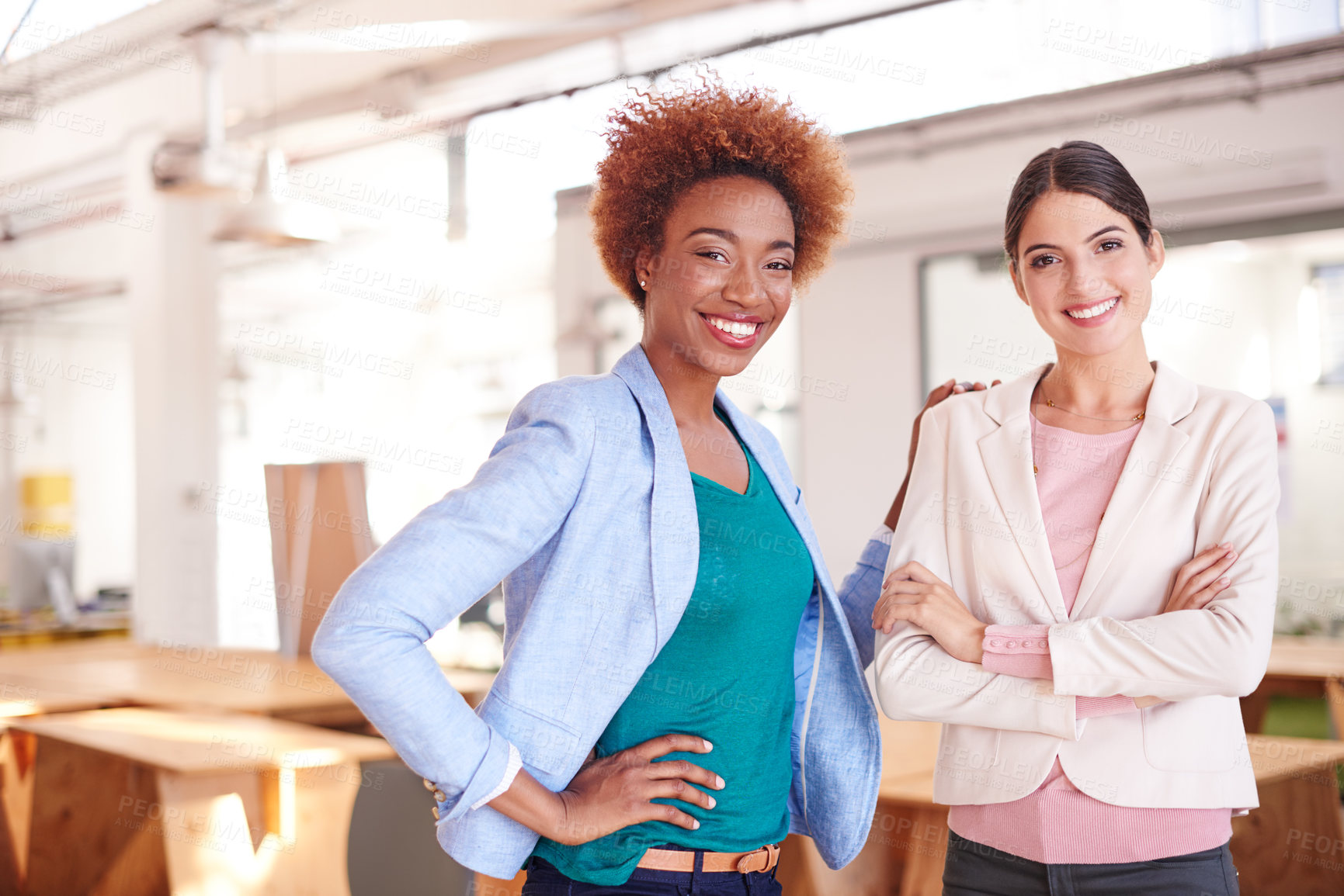 Buy stock photo Portrait of two coworkers standing in an office