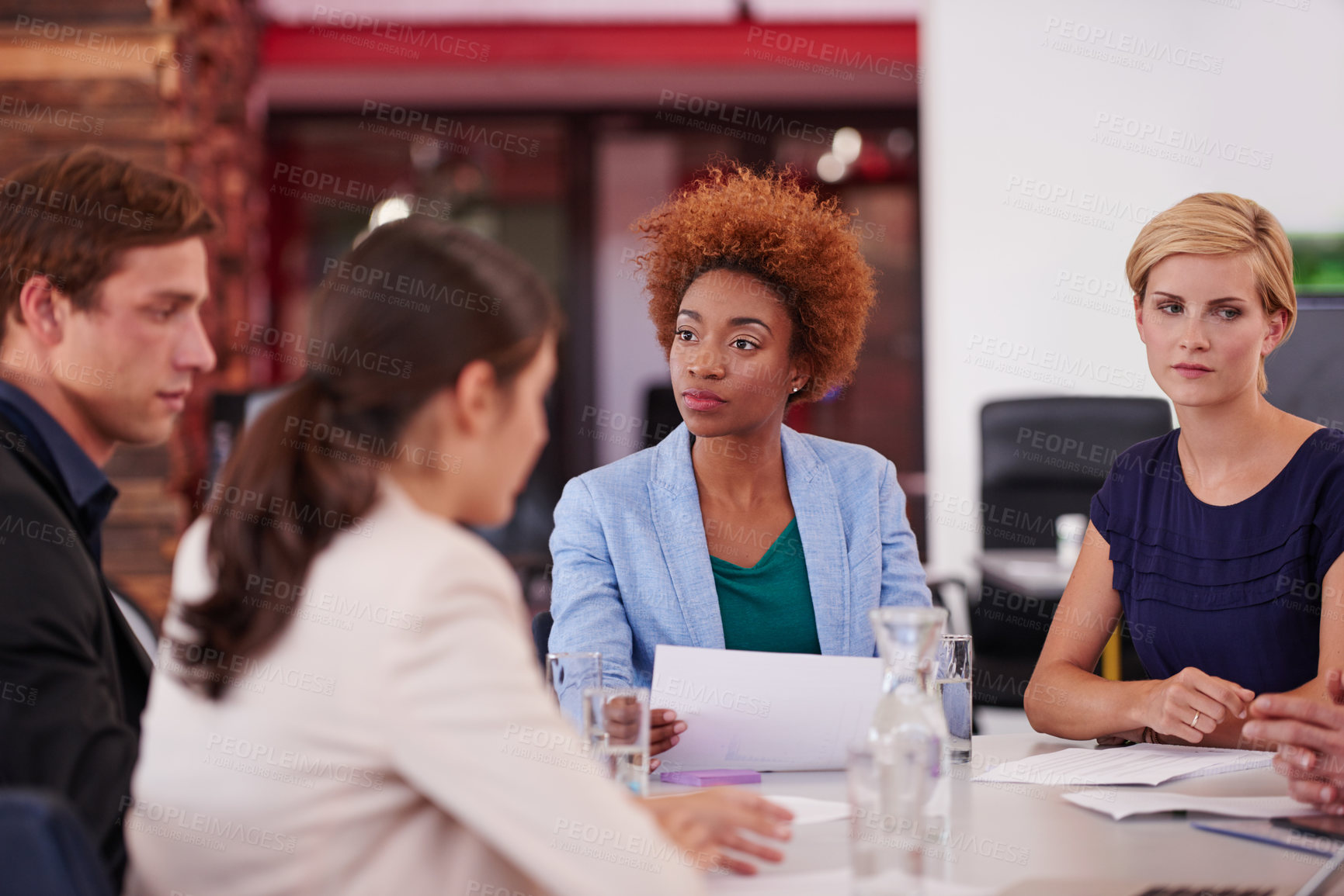 Buy stock photo Cropped shot of businesspeople in a meeting