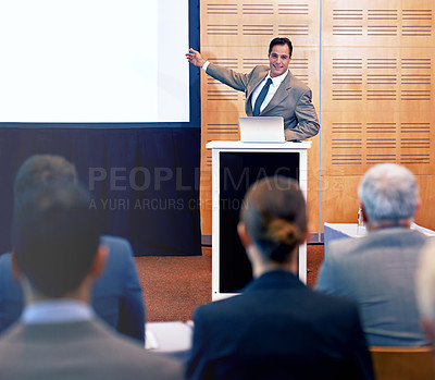 Buy stock photo Conference, speaker and man talking in meeting for business for discussion of stock market. Directors, women and people listening as team of employees in corporate company with presentation.