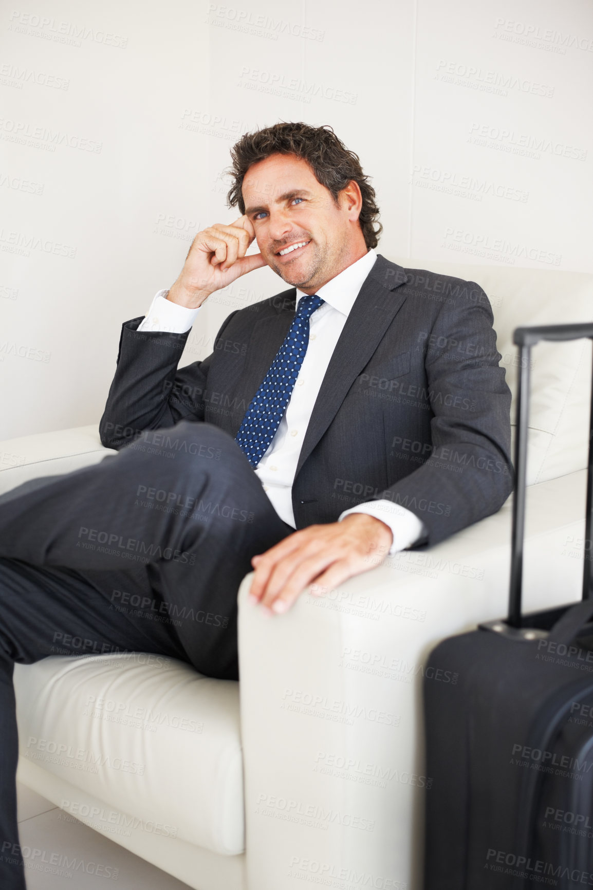 Buy stock photo Waiting, portrait of corporate man and suitcase in airport for business trip, international flight or departure. Lobby, luggage and happy male person in armchair for check in, travel or journey