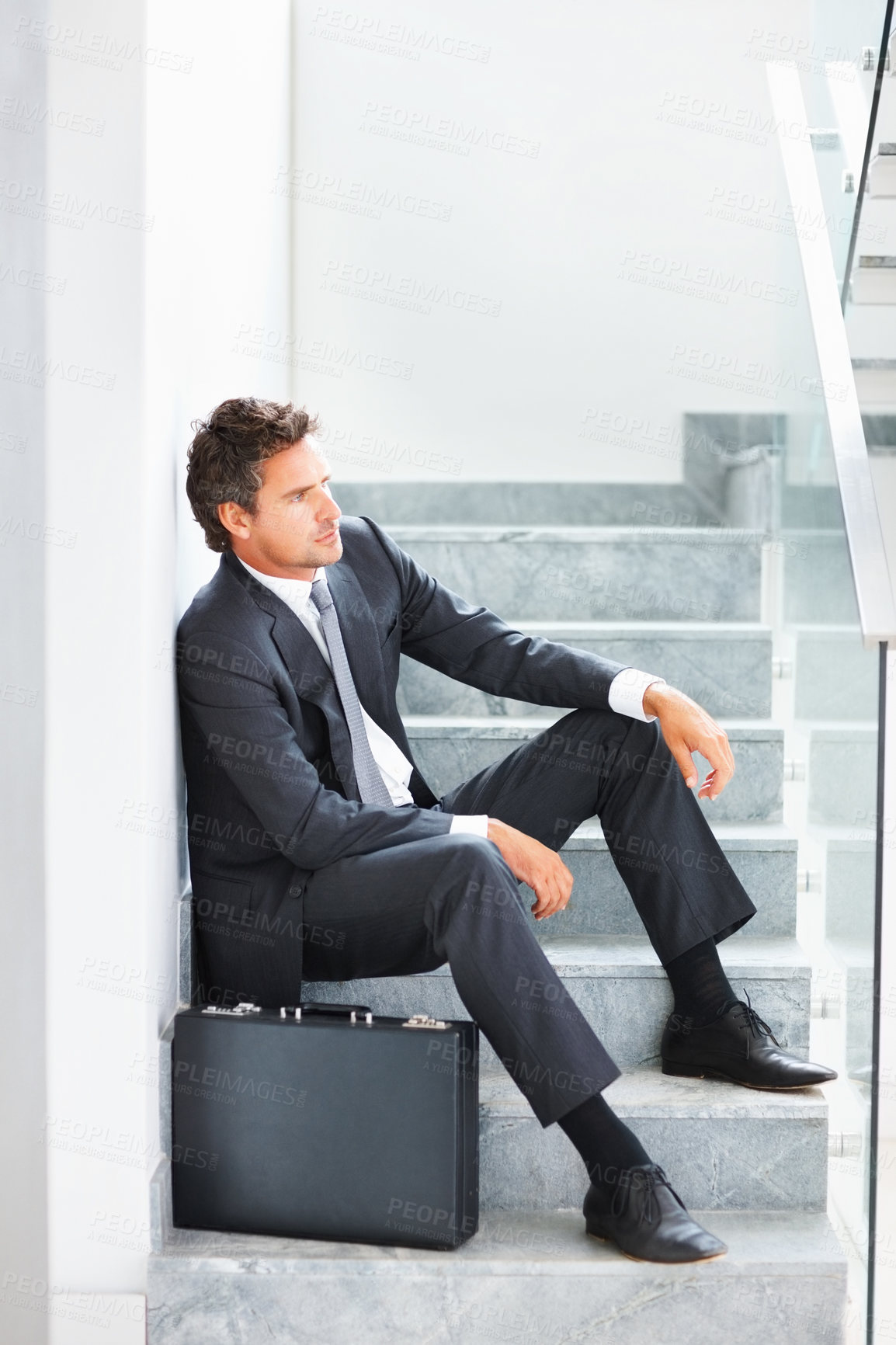 Buy stock photo Business, man and thinking on stairs in indoor by law firm as Lawyer with suitcase for planning, ideas and solution for court. Male attorney, bag and project , legal and decision for growth of career