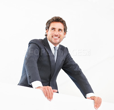 Buy stock photo Happy, businessman and thinking with wall, light and smile with pride for company with inspiration. Professional, Vision and lawyer with bright future in firm with boss, thought and contemplating.