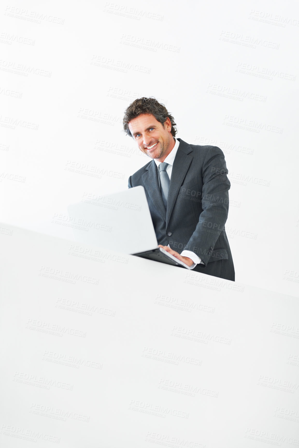 Buy stock photo Portrait, businessman and smile for laptop in studio, auditor and increase of stock market for trader. Mockup space, white background and happiness of employee, computer and investment for corporate