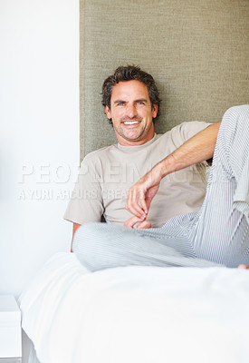 Buy stock photo Portrait, happy or man relax in bed in the morning after nap, break or awake from comfortable sleep at home. Mature guy, smile or wake up in bedroom for healthy rest, routine or cozy day in apartment