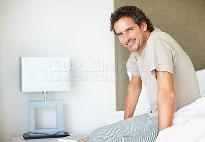 Buy stock photo Portrait, smile and man on bed in the morning after nap, break and awake from comfortable sleep at home. Happy mature guy wake up, relax in bedroom and apartment for healthy rest, routine or cosy day