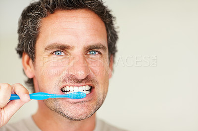 Buy stock photo Dental, man and portrait with teeth or toothbrush for morning routine, hygiene and healthy mouth. Mature, person and pride with brush for cleaning, washing and oral health with confidence or mock up