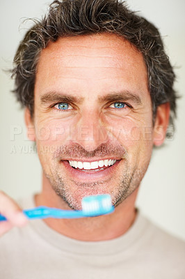 Buy stock photo Dental, man and portrait with smile or toothbrush for morning routine, hygiene and healthy mouth. Mature, person and face or happy with brush for cleaning, washing and oral health with confidence
