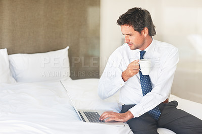 Buy stock photo Laptop, bedroom and coffee with a businessman getting ready for work at his home in the morning while checking an email. Corporate, computer on a bed and a professional employee drinking tea