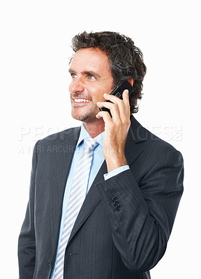 Buy stock photo Businessman, phone call and smile for networking, negotiation and deal on technology, chat and studio. Male person, communication and connection or discussion on smartphone by white background
