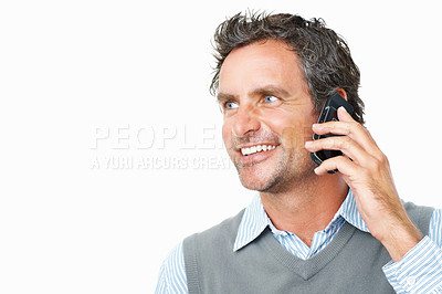 Buy stock photo Smile, phone call and mature businessman in studio for corporate communication or discussion. Happy, technology and professional male person on mobile conversation with cellphone by white background.