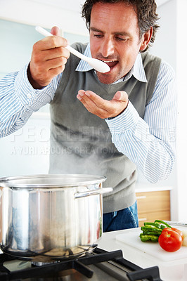 Buy stock photo Man, pot and tasting in kitchen at house for healthy food, lunch and cooking dinner with vegetables. Chef, oven and happy in home for breakfast, eating and wellness with diet nutrition and protein